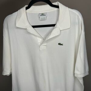 Lacoste polo shirt men size 8 green alligator on the front.
